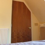 chambre_hotel_porte_salle_de_bain
